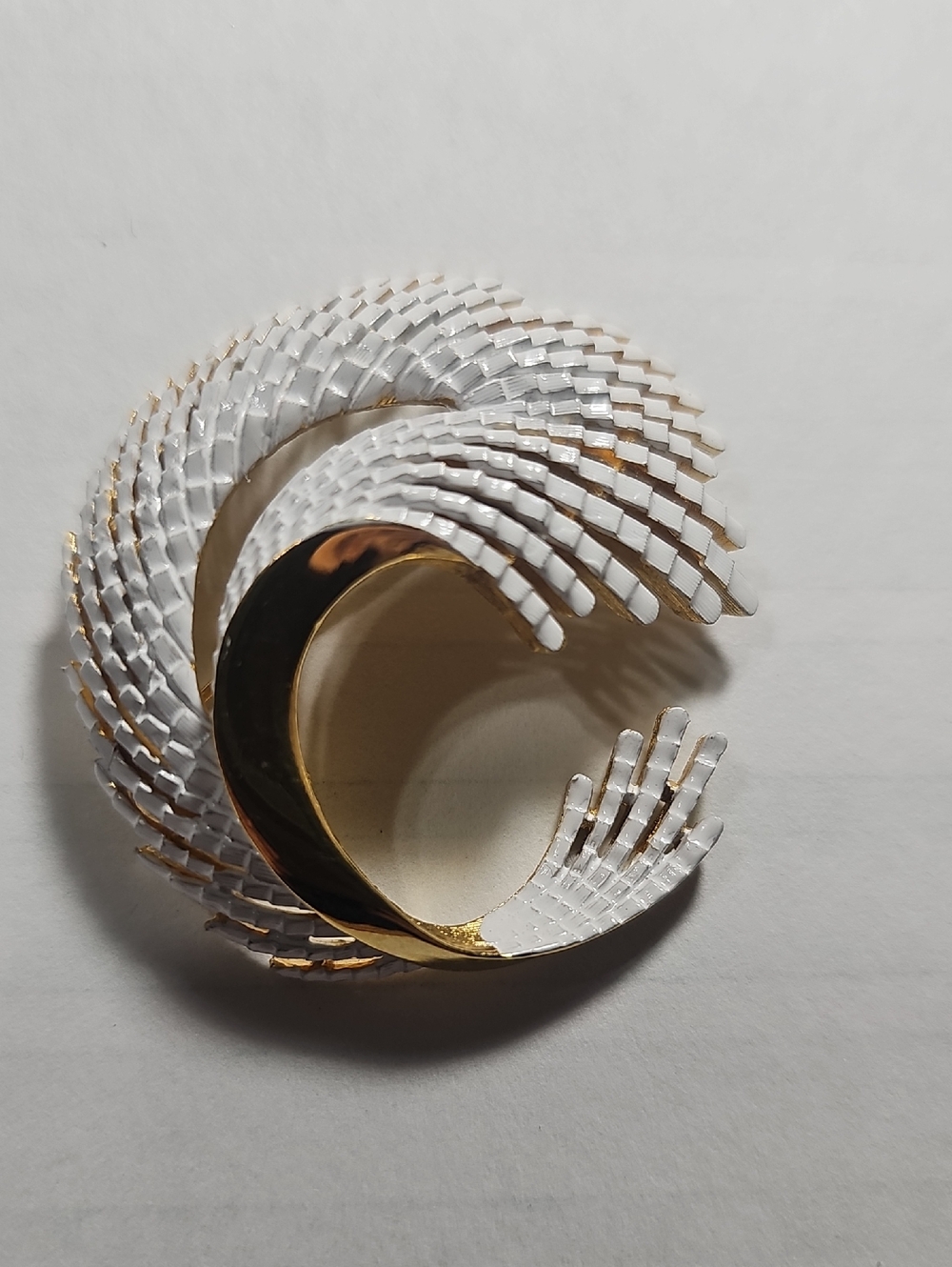 Trifari White and Gold Spiral Wave Brooch